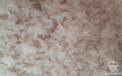 Промыть рис.