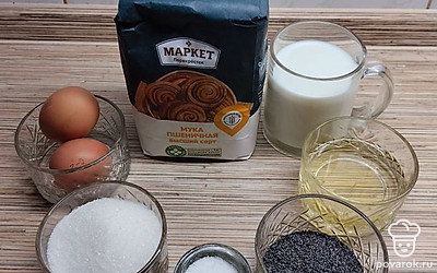 Подготовьте необходимые продукты: муку, молоко, яйца, растительное масло, соль, сахар, разрыхлитель мак. 